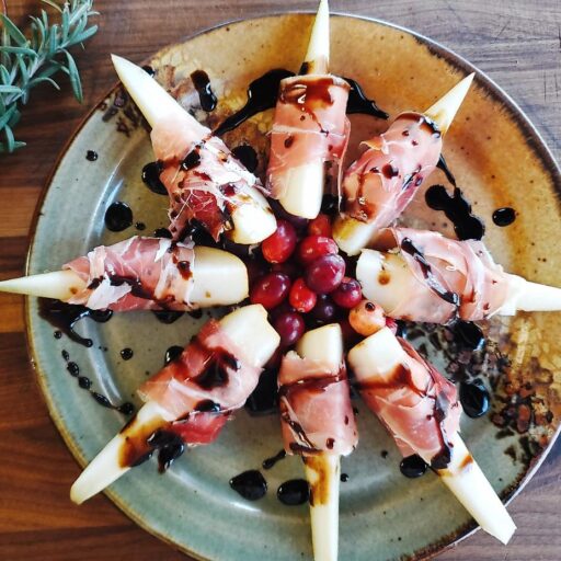 pears wrapped in prosciutto with a balsamic reduction