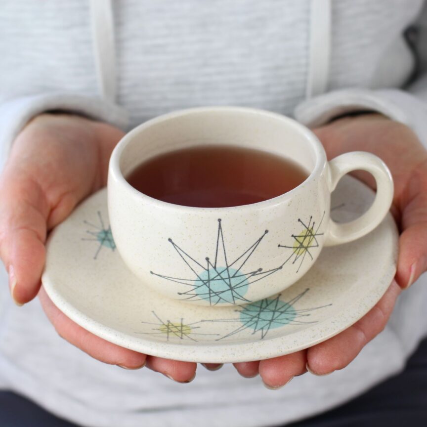 Hot tea in a tea cup with saucer