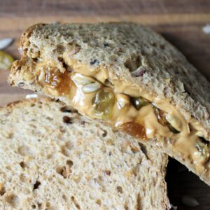 gooey peanut butter hiking sandwich cut in a wedge