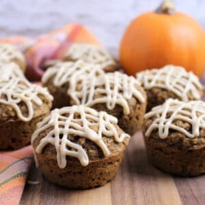 pumpkin muffins with maple glaze drizzled on top