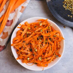 Carrot ribbons with a sprinkling of dukkah on top. Dukkah is a Middle Eastern condiment that is a breeze to make.