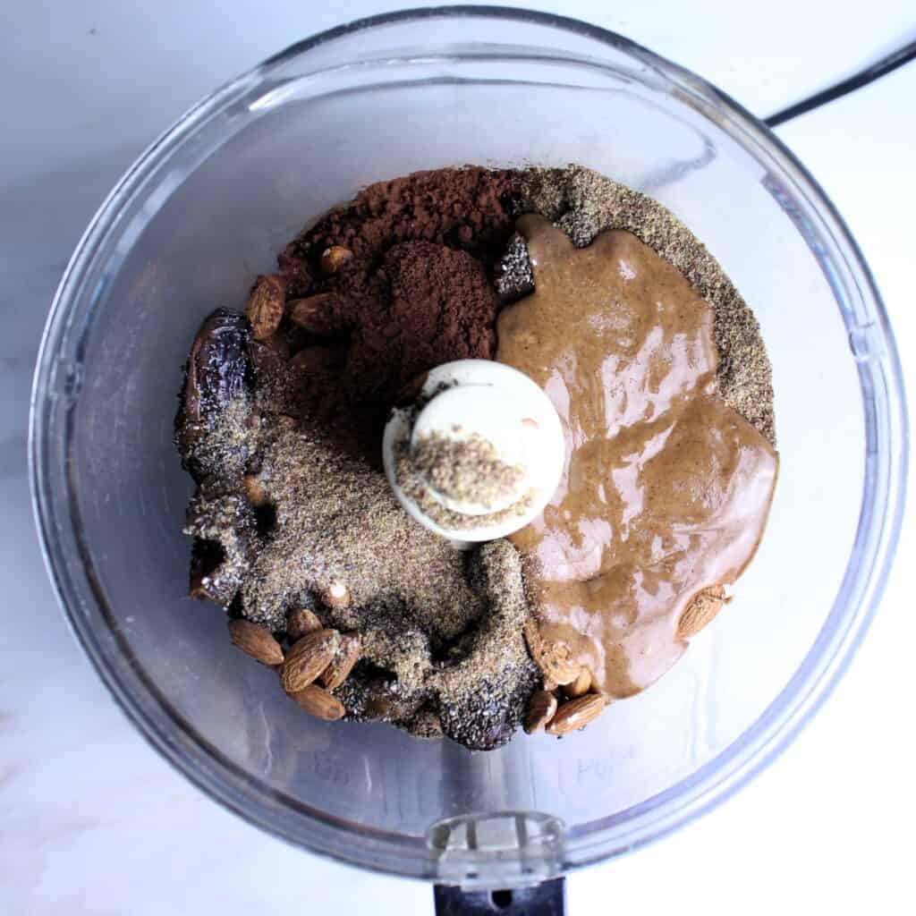All ingredients for Peanut Butter Date Balls in food processor.