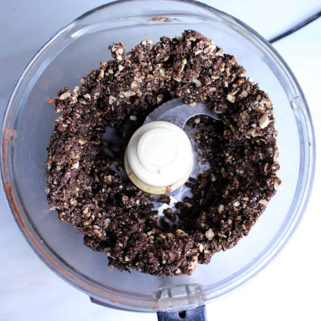 Peanut Butter Date Ball ingredients pulsed together in food processor.